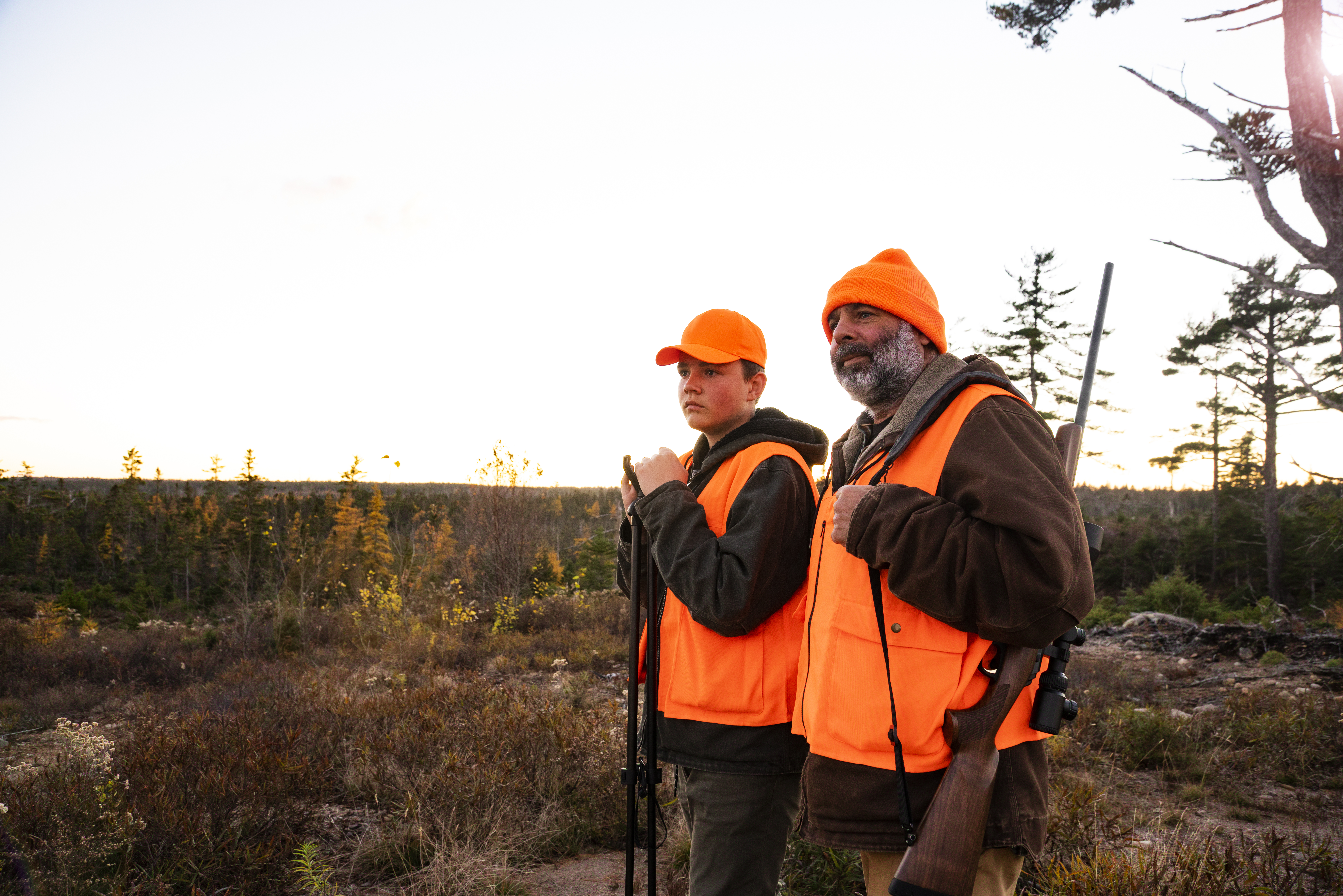 A teen deer hunting in the autumn in North America