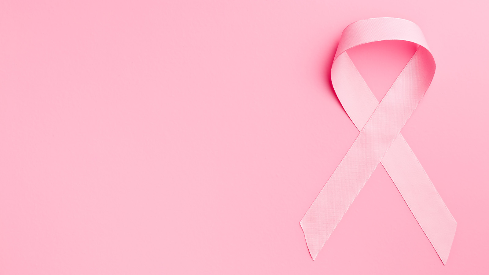 Pink ribbon on a pink background